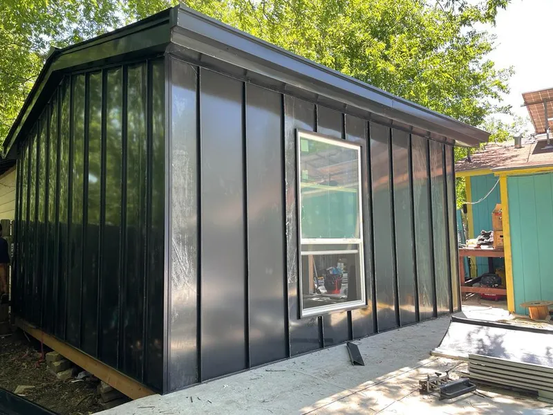 Black standing seam metal wall panels for Roof Inspection in Alfred