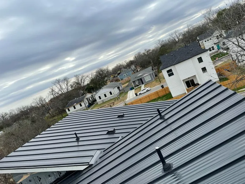 Standing seam metal roof panels with vents for Skylight Repair in Alfred